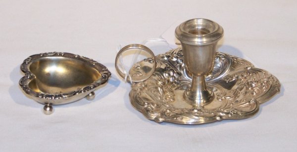 Pair Sterling Heart Shaped Bowl & Candle Stand: Pair Sterling Heart Shaped Bowl & Candle Stand. Candle stand made by Gorham with finger holder 4" across, other stamped sterling and is 2 1/4" across resting on 3 ball feet. Total weight is 62 grams.