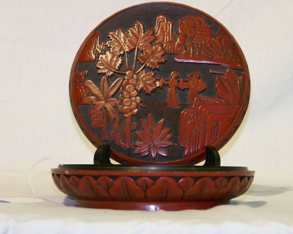 Vintage Chinese Cinnabar Finely Detailed Lidded Bo: Vintage Chinese Cinnabar Finely Detailed Lidded Box. With figure's and trees and house, round in shape. 2 parts and 7" across top.