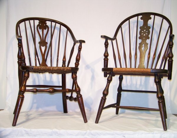 Pair Antique Carved Back Windsor Arm Chairs: Pair Antique Carved Back Windsor Arm Chairs,Both are different. Tallest is 39" tall , Both with rush seats.
