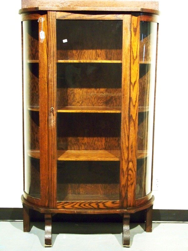 Antique Ebert Furn. Co. Oak Curved Glass Standing : Antique Ebert Furn. Co. Oak Curved Glass Standing Curio. With 3 shelfs with plate racks. Stands app. 61" tall 35 1/2" wide and app. 13" deep.