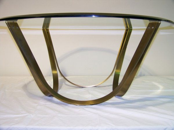 Roger Sprunger Brass Coffee Table For Dunbar: Roger Sprunger Designed Brass Coffee Table For Dunbar.app. 17 1/4" tall 27 1/2" wide. Glass top is 40 1/2" across with a wonderful beveled edge.