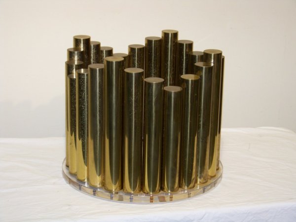 Design Institute of America Unique Coffee Table Br: Design Institute of America Unique Coffee Table 1970's, brass, lucite, glass. Tubes in unique form. Glass 36" dia Base 15" h x 17 3/4" dia