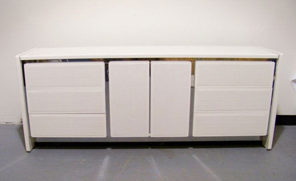 Mid Century Modern John Stuart White Lacquer Dress: Mid Century Modern John Stuart White Lacquer Dresser with chrome base and 6 drawer's and two doors and 3 drawers. 30" tall 19 1/2" deep and 76" long , Drawer front have cain.
