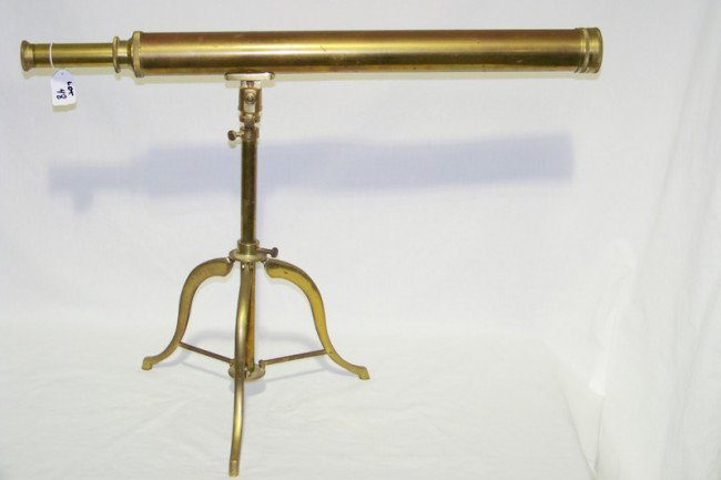 Vintage Standing Brass Telescope W/Retractable Legs: Vintage Standing Brass Telescope W/Retractable Legs, Telescope is 26" long and app. 30" tall standing.Resting on 3 tripod legs.