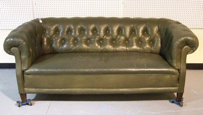 Vintage Leather Davenport Sofa: Vintage Leather Davenport Sofa in a green leather , has nail head trim around base. App. 79" long 36" deep app. 33" tall with rolled arms.