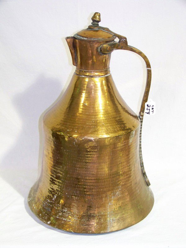 Massive Vintage Hand Hammered Copper Waterpitcher: Massive Vintage Hand Hammered Copper Waterpitcher with large handle. Stands app. 21" tall and 14" across base.