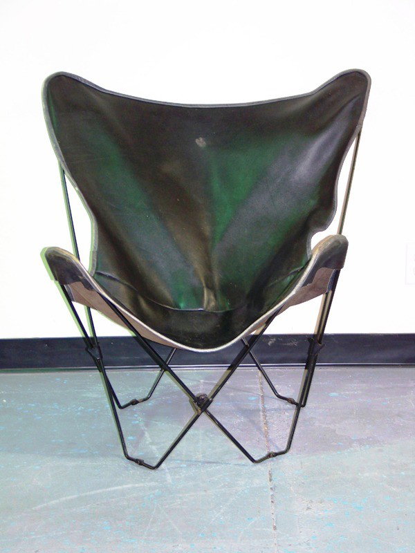 Mid Century Modern Leather & Iron Folding Sling C: Mid Century Modern Leather & Iron Folding Sling Chair. Leather has a tag from Champlain Leather , Burlington Vermont. 34 1/2" tall 31" wide and app. 31" deep.