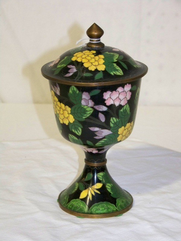Early Chinese Cloisonne Lidded Vase: Early Chinese Cloisonne Lidded Vase. Stamped China into base. Has flowers and foilage and stands app. 8 1/2" tall . in the shape of a chalice with a lid.app. 4 1/2" across.