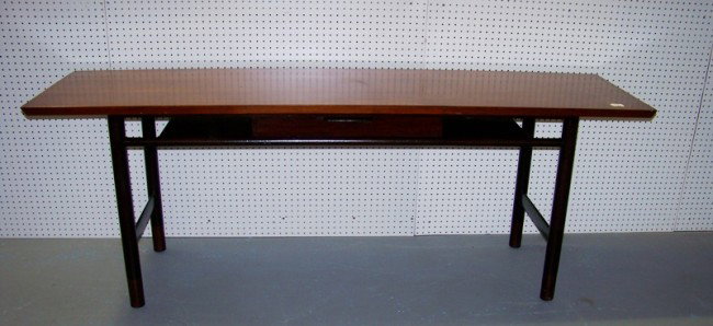 Early Edward Wormley For Dunbar Hall Table: Early Edward Wormley For Dunbar Hall Table with one drawer and has brass capped feet. Has label in drawer and stands app. 29 1/4" tall 80" long and 21" deep.