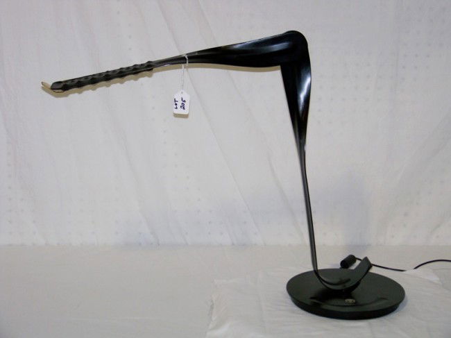 Herman Miller Swivel Base Swing Arm Desk Lamp: Herman Miller Swivel Base Swing Arm Desk Lamp. Great desk light on a 8 1/2" round base. Stands 20" tall with arm down. Arm is 18" long. Great working lamp.