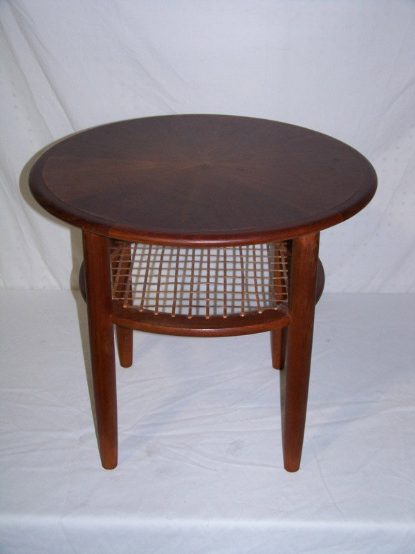 Vintage Danish Modern Teak Round Sunburst Top Tab: Vintage Danish Modern Teak Round Sunburst Top Table. 19 1/4" tall 21 1/2" across top. Has cain bottom shelf.