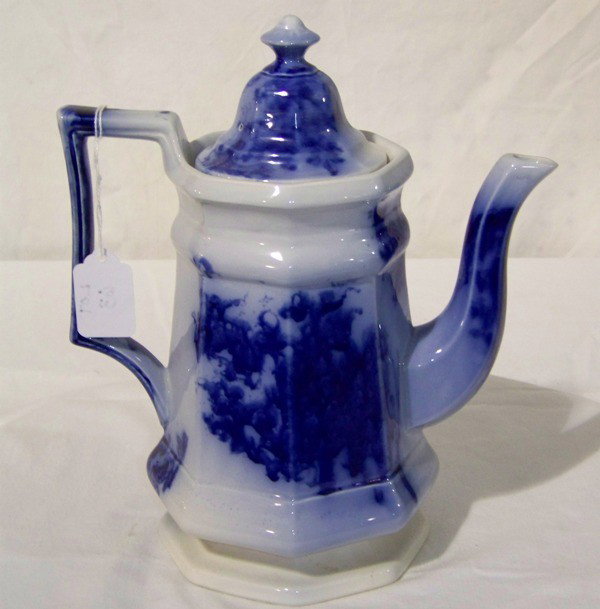 Vintage English Flow Blue Handled Water Pitcher: Vintage English Flow Blue Handled Water Pitcher with lid. App. 11" tall and 9" wide from spout to handle.