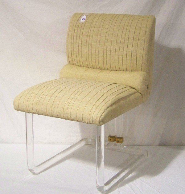 Charles Hollis Jones Brass & Round Lucite Chair : Charles Hollis Jones Style Brass & Round Lucite Chair. Great chair , has thick round Lucite supports with brass fittings. App. 33" tall 20" wide and app. 25" deep.