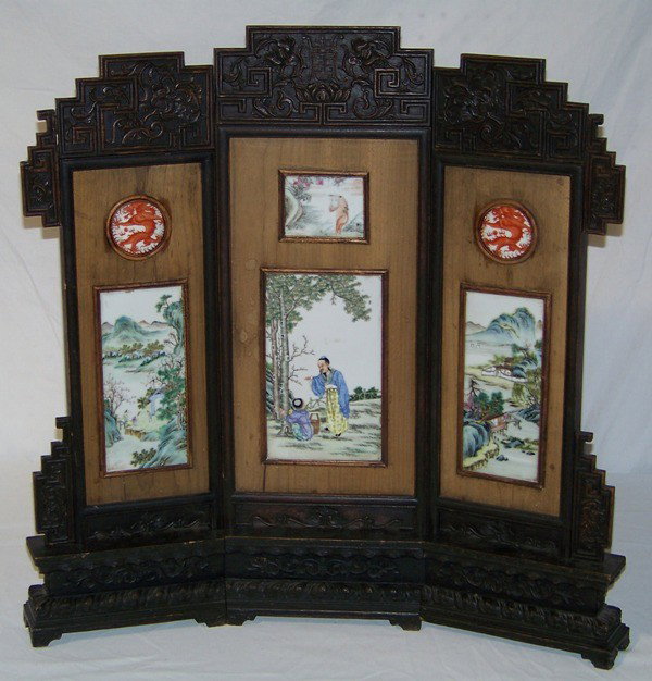 Early Chinese Signed 3 Panel Porcelain Table Scre: Early Chinese Signed 3 Panel Wooden Carved & Porcelain Table Screen. Has 3 porcelain landscape panels with people and a Monkey panel in center, also has 2 round five finger dragon panels.Left and righ