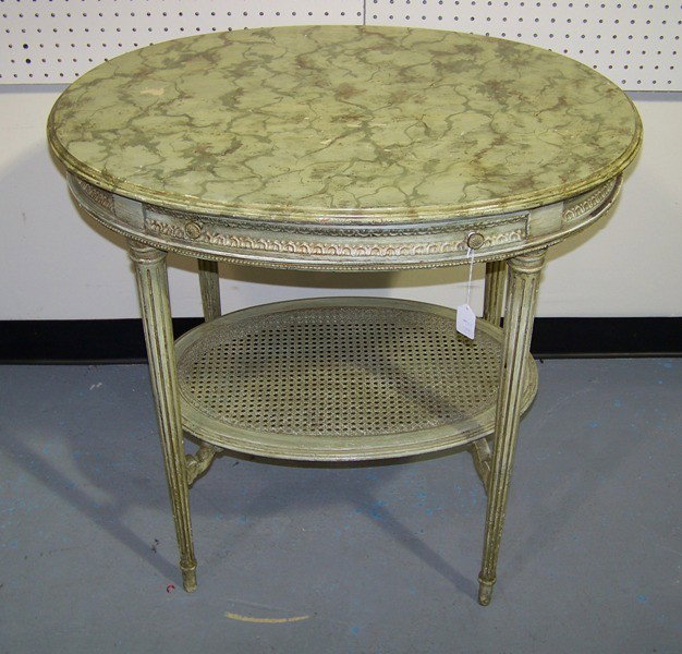 Antique French Oval Top Cain Table : Great Antique French Oval Top Cain Table with four tapering legs and one small drawer with Cain shelf base. Now finished in a green faux finish and standing 29 1/2" tall x 30" wide x 22" deep.