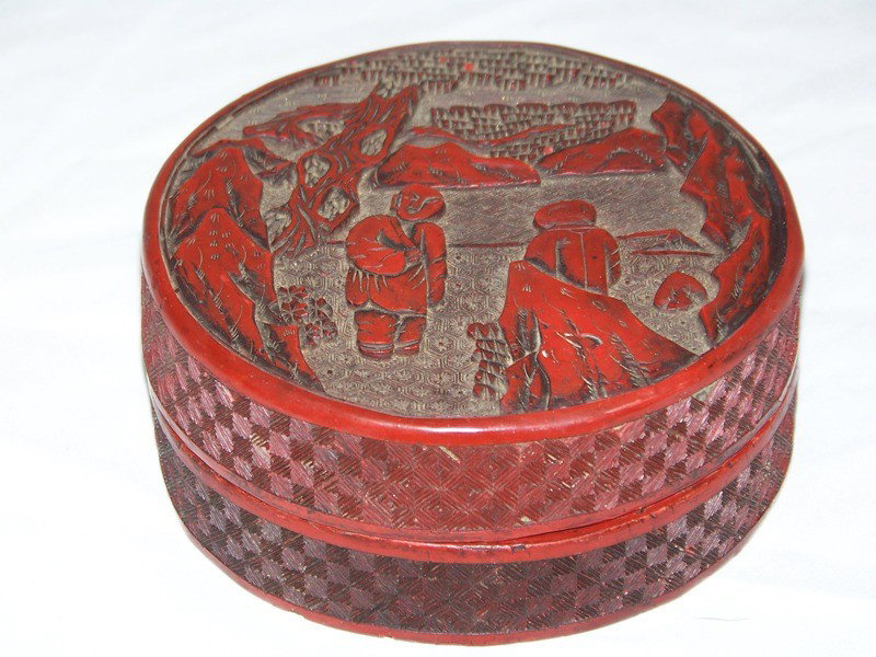Antique Chinese Cinnabar Round Covered Box: Antique Chinese Cinnabar Round Covered Box. Box has figures with mountians and landscapes.5 1/8" across and 2 1/4" tall.
