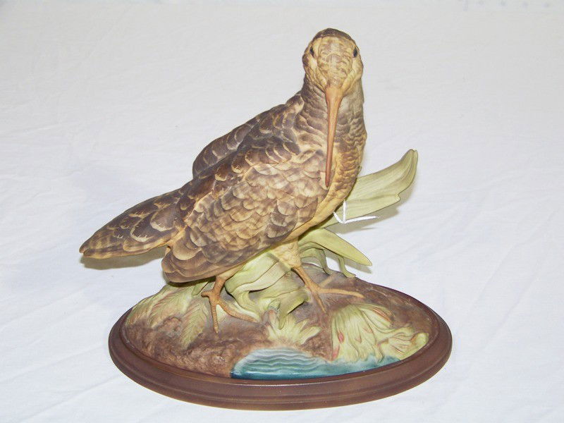 Vintage Boehm Porcelain Woodcock Bird With Stand: Vintage Boehm Porcelain Woodcock Bird With Stand. Great bird with porcelain base. Bird is 10 3/4" tall and app. 10 1/2" wide.