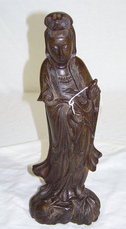 Vintage Wood Carved Chinese Quan Yin on Ox: Vintage Wood Carved Chinese Quan Yin standing on Ox and holding peach. Figure is app. 12" tall.