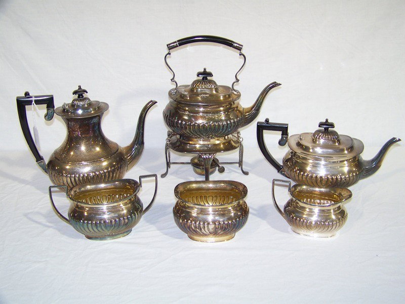 7 Pc. Early Sheffield Tea Set " Kentshire Pattern": 7 Pc. Early Sheffield Tea Set " Kentshire Pattern".Has 9" tea pot,6" tea pot,9" kettle with stand and heater,creamer & sugar and finger bowl.
