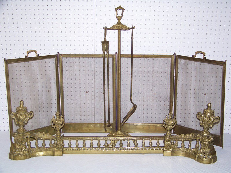 Antique Ornate French Bronze Fireplace Set: Antique Ornate French Bronze Fireplace Set. Has bronze standing tool holder with shovel and tongs. Also has folding screen with bronze mount chinets. Screen measures approx. 20" tall.