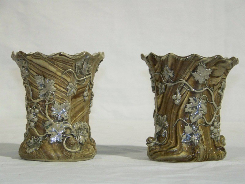 Pair of Rare Bennington Scroddled Ware Vase's w/ Gr: Pair of rare scroddled ware vase's, These are one of the rarest items Bennington made. About 4" tall each and in very good condition with a grape vine pattern with silver overlay, each has a plaque on