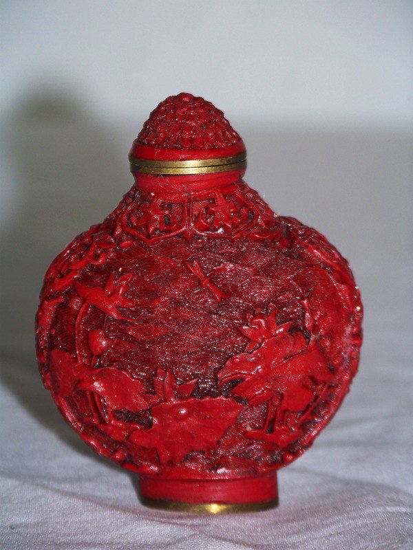 Vintage Chinese Cinnabar Signed Landscape Snuff Bot: Vintage Chinese Cinnabar Signed Landscape Snuff Bottle. Signed on base. App. 2 1/2" tall and 2" wide.