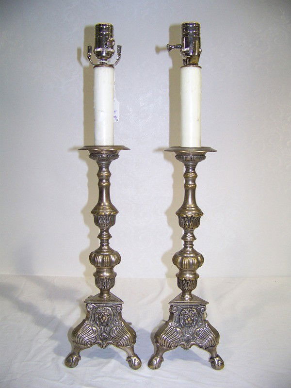 Pr Vintage Silver Plate Claw Footed Candle Stick L: Pr Vintage Silver Plate Claw Footed Candle Stick Lamps. With Lion mounts on faces of lamp base. Each is 24 1/2" tall resting on three ball and claw feet.