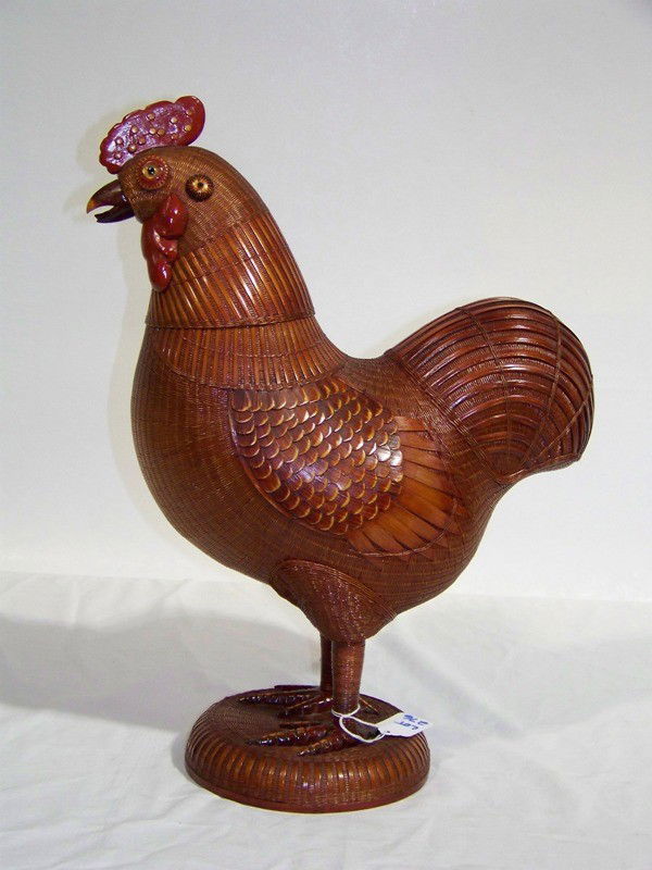 Vintage Chinese Wicker Rooster Ice Bucket: Vintage Chinese Wicker Rooster Ice Bucket ??. Great wicker wrapped standing Rooster, all finely wrapped, Head comes off to expose a lacquer interior. Stands app. 17 1/2" tall.Has paper label to base,