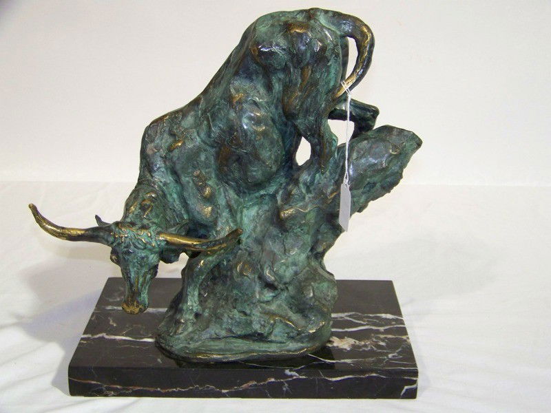 Signed " Milo " Bronze Sculpture of Long Horn St: Vintage Signed Milo Bronze Sculpture of Long Horn Steer. Great bronze signed Milo resting on a marble base. Stands app.13" tall and 12" wide.