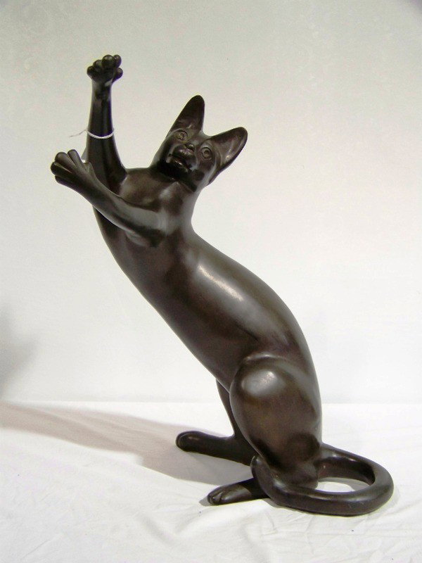 Large Bronze Playing Kitty Cat Sculpture: Large Bronze Playing Kitty Cat Sculpture. Great Cat standing on his back legs playing. Stands app. 20 1/2" tall and app. 17" wide and 16" deep.