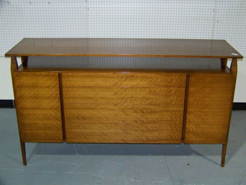 Jens Risom Modern Floating Top Sideboard: Jens Risom Modern Floating Top Sideboard. Great sideboard matching previous lot. Crafted with four drawers and two doors with two shelves. Dimensions: 64.5" length x 19" deep x 36.75" tall.