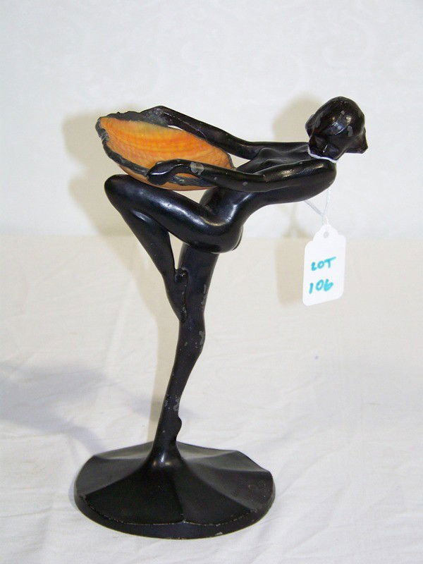 1922 Frankart - Art Deco Nude w/Slag Glass Dish: 1922 Frankart - Art Deco Nude w/Slag Glass Dish. Painted Black over metal, stamped Frankart 1922 T301. Holding orange slag glass dish in pose. Stands approx 9' tall x 6' deep.