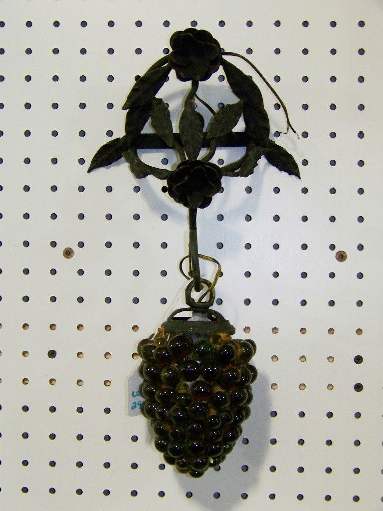 Vintage Wrought Iron Grape Cluster Hanging Light: Vintage Wrought Iron Grape Cluster Hanging Light. Great wall sconce with a glass beaded grape cluster shade.Hangs app. 14" long and app. 8" wide.