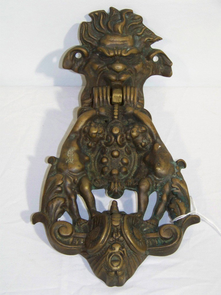 Great Early Figural Bronze Door Knocker: Great Early Figural Bronze Door Knocker.11 1/4" tall and app.6" across.