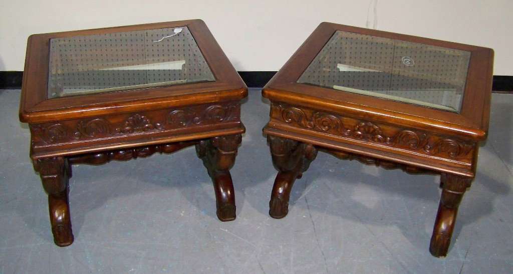 Pair of Theodore Alexander Carved End Tables: Pair of great carved end tables, with a flower carved medallion to center leg supports.Each stands app.21" tall and tops are 27 1/2" square with beveled glass inserts.