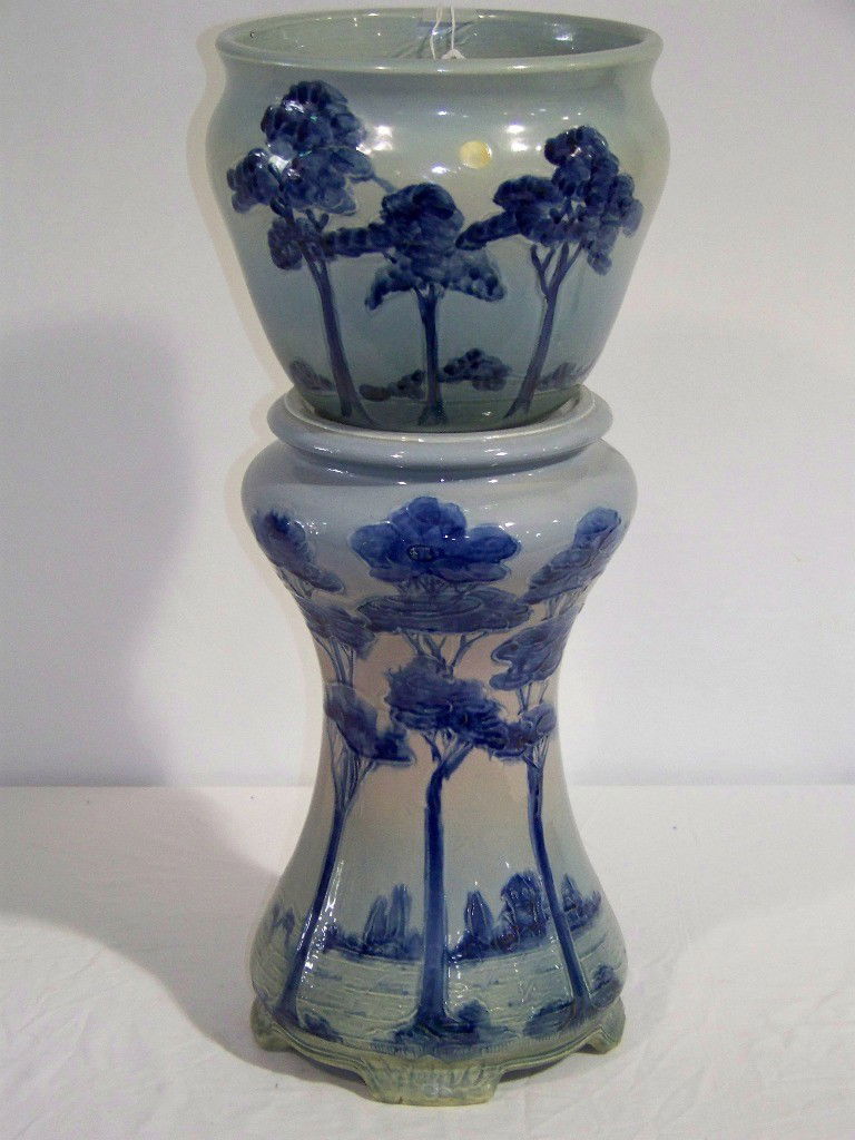 Vintage Signed Weller HP Landscape Jardiniere & Pe: Vintage Signed Weller HP Landscape Jardiniere & Pedestal. Great design in blue and white with tress on jardiniere and the sun shining down upon them. Measures approx 8.75" tall. Stand is 16.5" tall wi