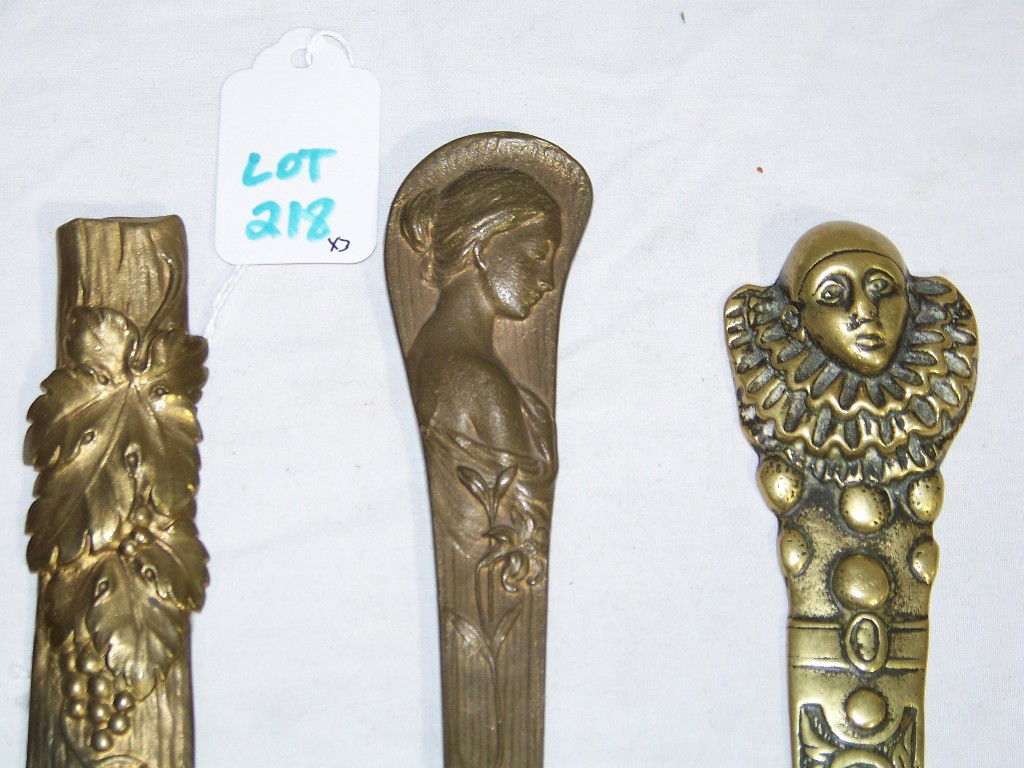 3 Antique French Art Nouveau Bronze Letter Openers: 3 Antique French Art Nouveau Bronze Letter Openers.Long 11 1/2" one with female figure is stamped on back.Leaf one is stamped Wien and is 9 1/4" long and clown one is 8" long.