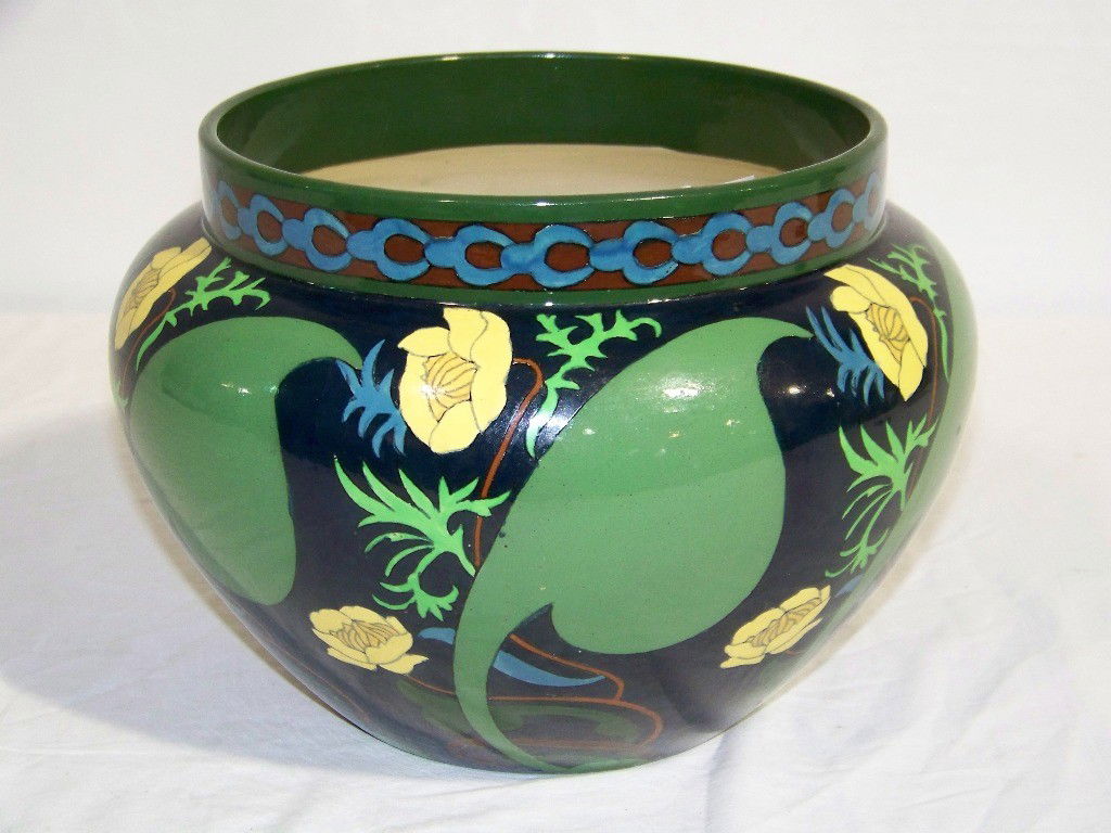 Antique "Intarsio England " Foley H. Painted Jard: Antique "Intarsio England " Foley H. Painted Jardiniere. Hand Painted in a wonderful deep blue and has yellow flowers with a brown and blue design at top of Jardiniere. Stands app.7 1/2" tall and app.