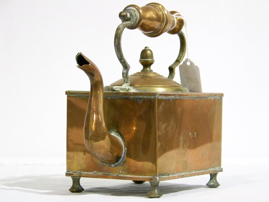 Fine 19th C. Copper Bun Footed Tea Kettle: Fine 19th C. Copper Bun Footed Tea Kettle. Great tea kettle with Copper handle and an Acorn finial to lid. Has a V with a star R on the two long sides.Stands app.8 1/2" tall,8 1/2" wide and 4 1/2" dee