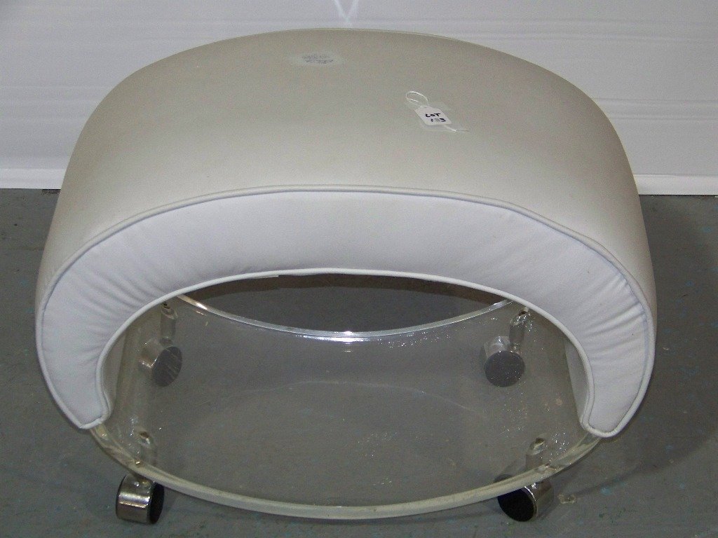 Mid C. Modern Oval Lucite Vanity Bench: Mid C. Modern Oval Lucite Vanity Bench. Great Lucite base oval vanity bench. Stands app.18" tall,26" wide and 16" deep on four Castor wheels.