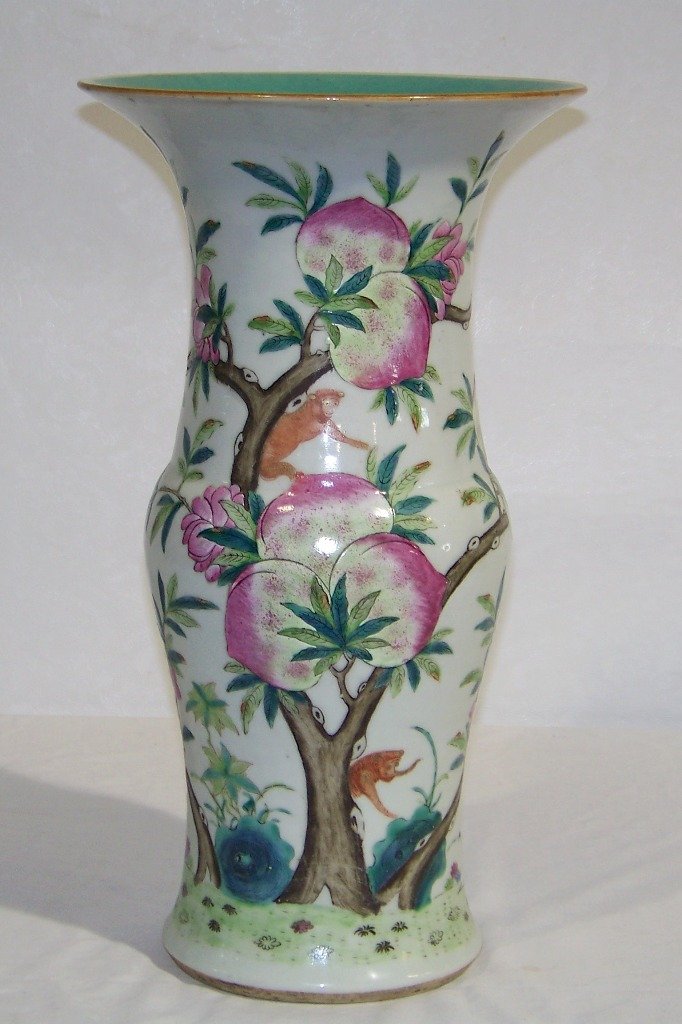 Vintage Chinese 16" Porcelain Vase w/ Bats: Vintage Chinese 16" Porcelain Vase w/ Bats,Monkeys & Fruits.Great vase all hand painted with great flowers, bats and monkeys in the trees.Stands 15 1/2" tall and 8 1/2" across top, with a light green 