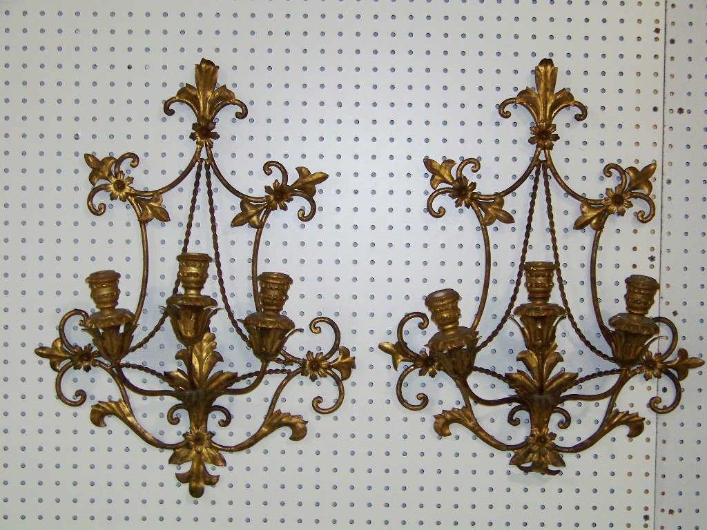 Pair of Vintage Italian Style Tole Wall Sconces: Pair of Vintage Italian Style Tole Wall Sconces. Each has three candle holders. Sconce is app.25",app. 19" wide and 6" deep.