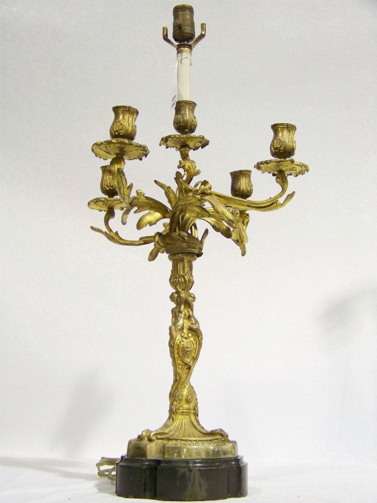 Early French Dore Bronze Cherub Candle Stick Lamp: Early French Dore Bronze Cherub Candle Stick Lamp. Great lamp with Cherubs around center post with 5 lights now electrified and stands app.29" tall.