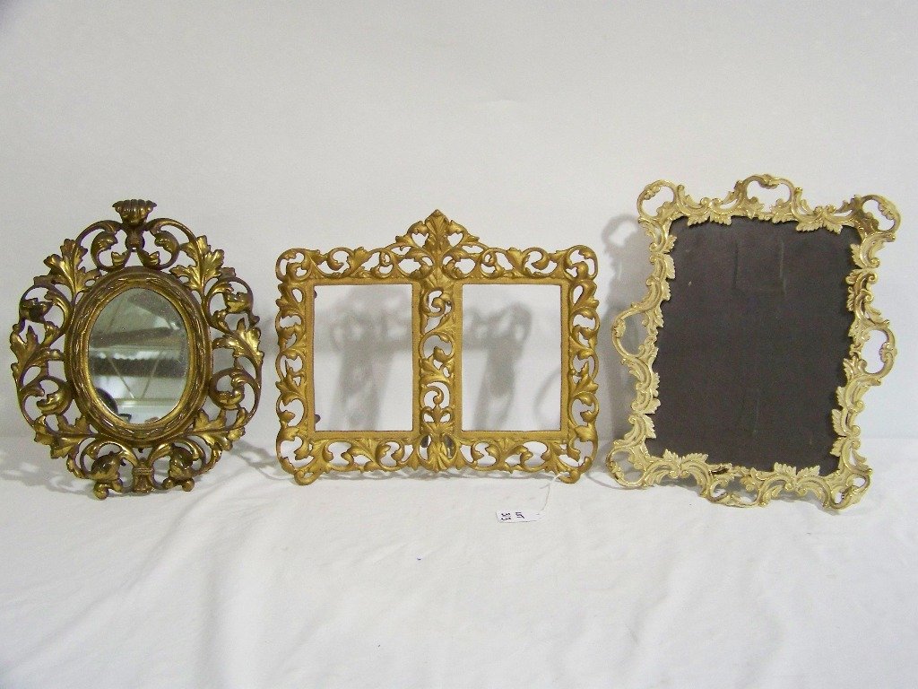 3 Vintage Ornate Bronze Picture Frames: 3 Vintage Ornate Bronze Picture Frames. Two are bronze and double frame is Iron and is 12 1/2" x 9".Largest Bronze frame is 12 1/2" x 10" across.