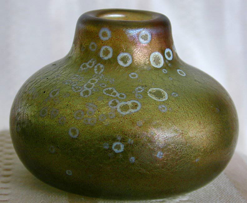EARLY MARK PEISER ART GLASS VASE: A fine and early art glass vase by the renowned Penland, North Carolina glass master MARK PEISER; an early example signed and dated Mark Peiser 1969; designed in green opalescent glass with white circ