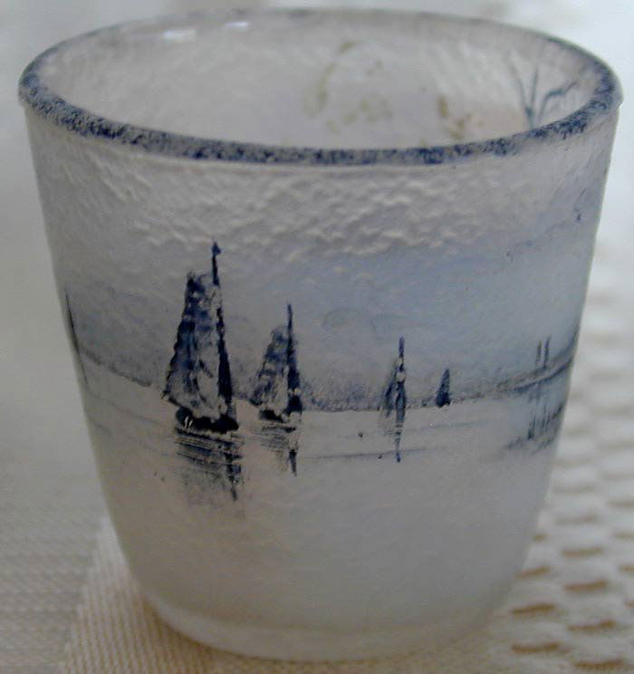 DAUM NANCY ENAMELLED SHIPS VASE: A DAUM NANCY art glass vase enamelled with a design of a lake shore with sailboats; signed in gold enamel Daum, Nancy; 1.25"H; very good condition with no chips, cracks or restorations.