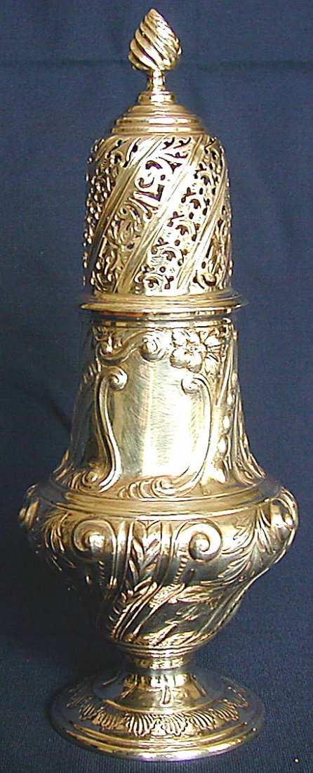 ANTIQUE STERLING MUFFINEER THOS BRADBURY LONDON 18: A fine antique sterling silver muffineer marked with hallmarks by the London silversmith Thomas Bradbury & Sons (Thos. Bradbury III & John S. Henderson) dated 1883; 8.75"H; 9 troy ounces. PROVENANCE: 