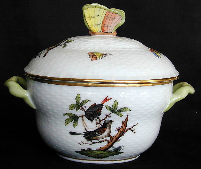 HEREND ROTHSCHILD COVERED BONBON BUTTERFLY FINIAL: A fine Herend porcelain covered bonbon container with a butterfly finial and green twist handles in the Rothschild pattern, 5.5"L x 4.5"H, good condition with no chips, cracks or restorations; fully m