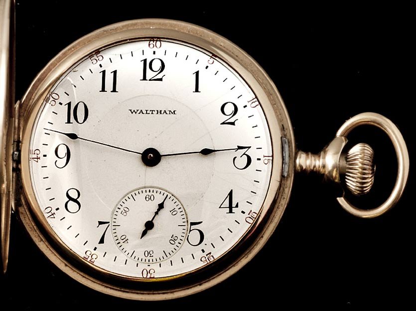 WALTHAM 14K POCKET WATCH: A.W.W.Co.Waltham 17 jewels 14K pocket watch in a hunter case with porcelain face and arabic numerals. Watch is in working condition at this time. SN 20,527,396 - 1916. Hunter case is decoratively engr