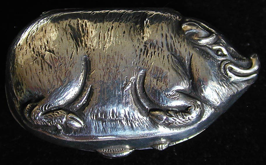 ANTIQUE STERLING SILVER "PIG" PILL/SNUFF BOX: A vintage sterling silver pill or snuff box designed in the shape of a smiling pig; marked 925; 2.25"L x 1.5"W.